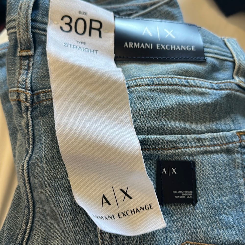 Armani brand new Men's blue jeans with tags.